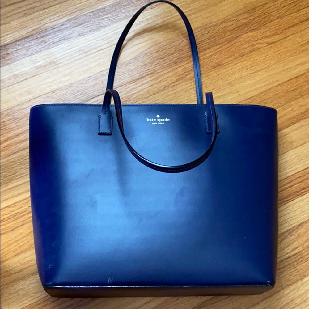 Kate Spade navy with a purple hint purse.